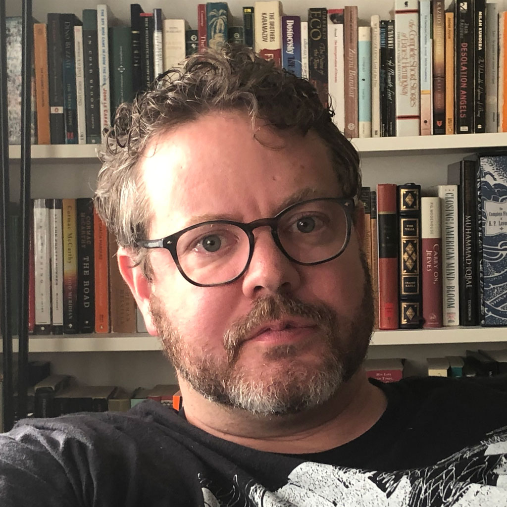 Yorkville University professor&nbsp;Christopher McClure in his office