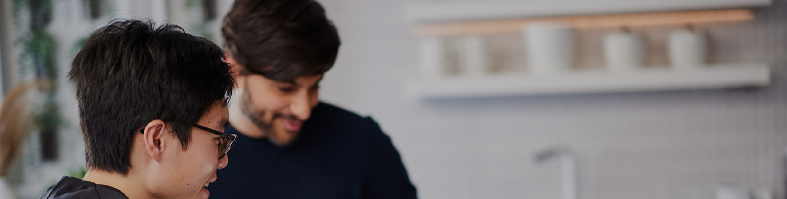 Two male students working together